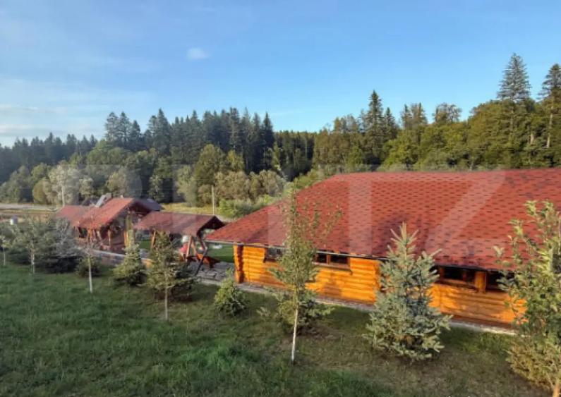 Cabana din lemn rotund, 2 camere, 140 mp, teren 2800 mp, Pal - 17