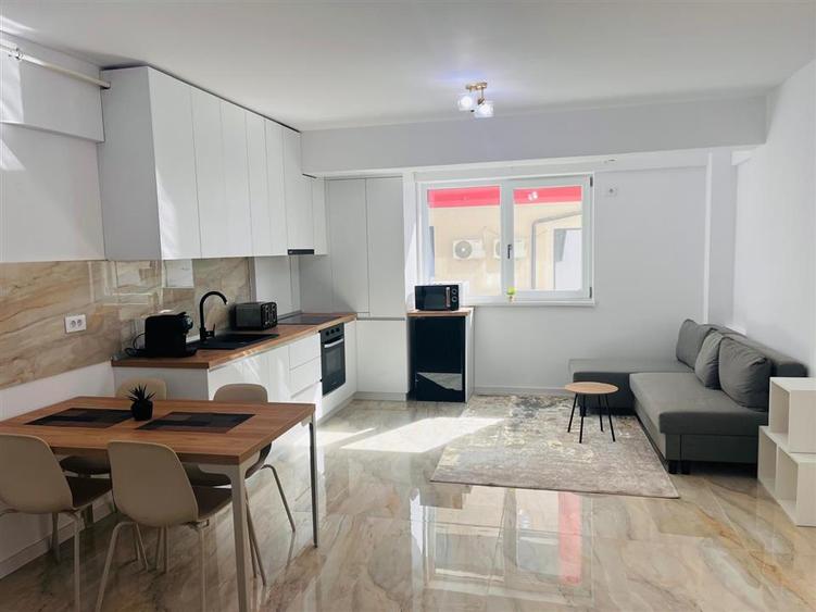 Apartament cu 2 camere semidecomandat, mobilat în Calea București