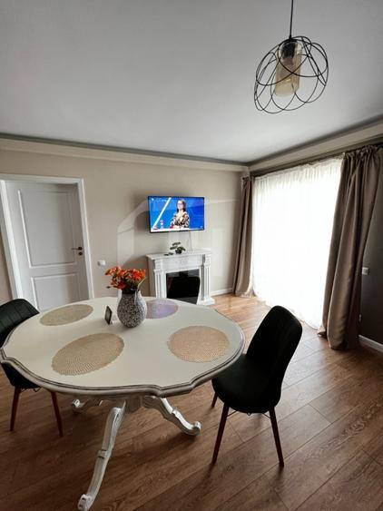 Apartament cu 2 camere semidecomandat, mobilat în Borhanci
