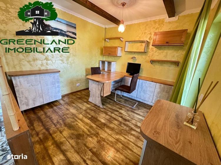 Apartament cu 4 camere decomandat în Bucium