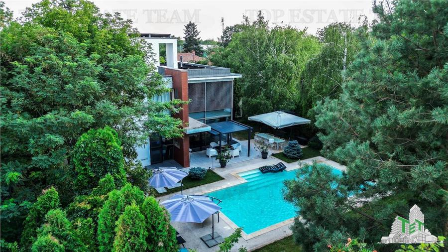 Vila premium cu 7 camere, piscina privata si terasa de 90 mp, situata in Otopeni - 1
