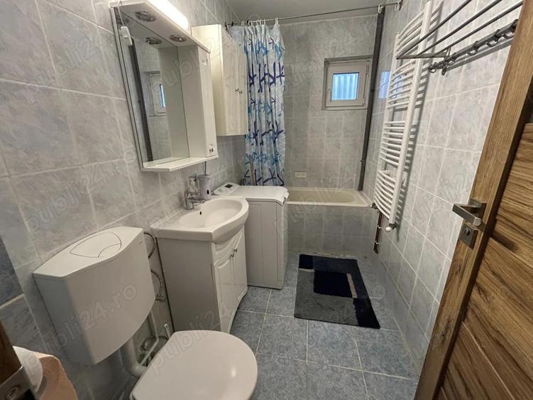 Inchiriez apart.3 cam.central,in spate la BCR,modern,centrala proprie - 2