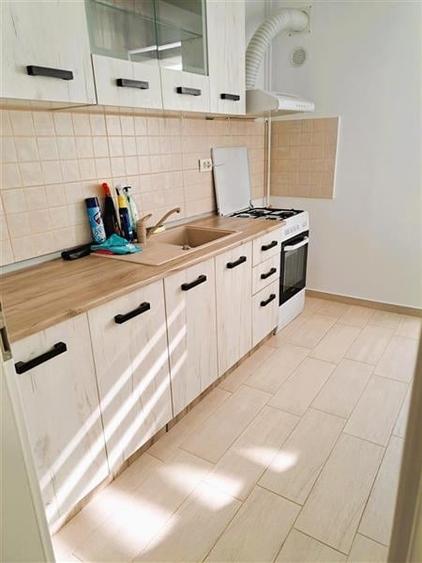 Apartament 2 camere, etaj 2, mobilat si utilat . Zona Tractorul - 10