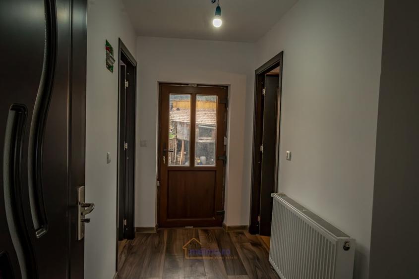 Casă cu 3 camere cu Teren 400 Mp în Comănești