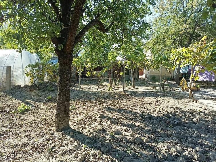 Casă cu 4 camere cu Teren 1070 Mp în Girocului