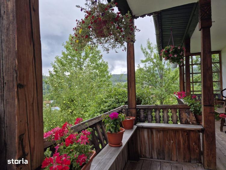 O casa cu suflet intr-un loc de vis va asteapta pentru o vizionare. - 14