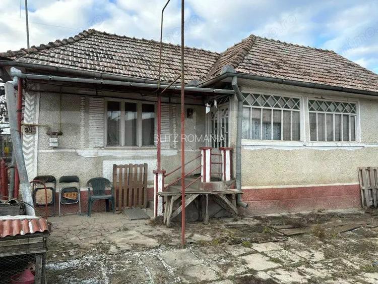 Casa 70mp+4 anexe+teren 1400mp(14 ari) intravilan,zona Lechinta