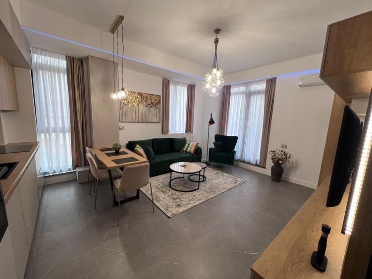 De inchiriat 2 camere lux, central - zona Eminescu - 1