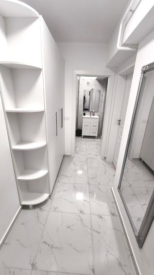 Apartament 1 camera mobilat, etaj 1, bloc NOU, statie autobuz CUG - VA - 8