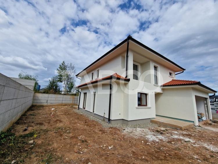 Casa individuala de vanzare cu teren, terasa, garaj si curte Selimbar - 15