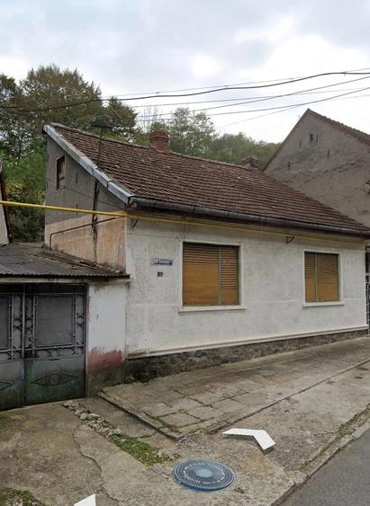 Casă cu Teren 677 Mp în Central