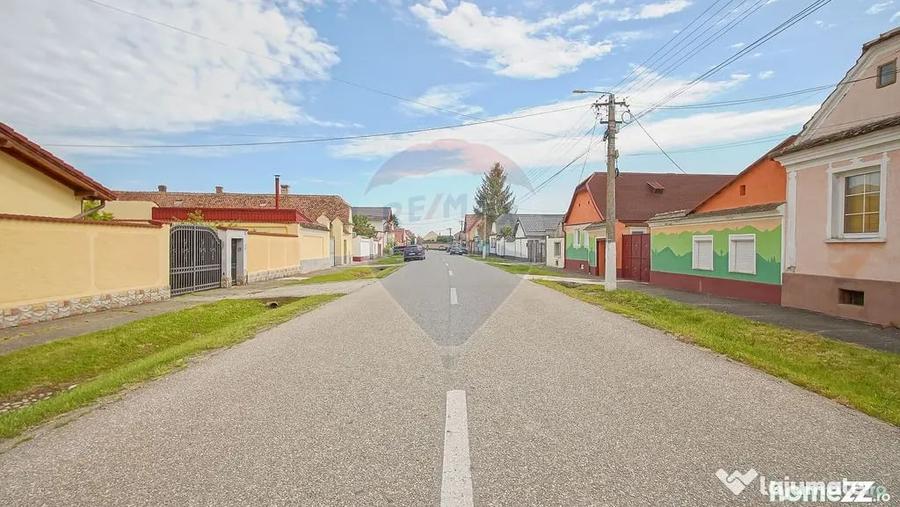 Casă cu 10 camere cu Teren 1300 Mp în Hălchiu