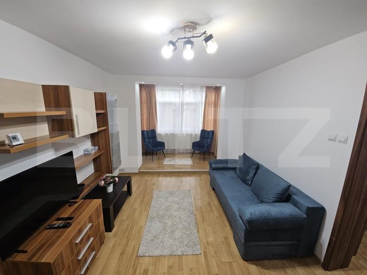 Apartament cu 2 camere semidecomandat, mobilat în Podu Roș