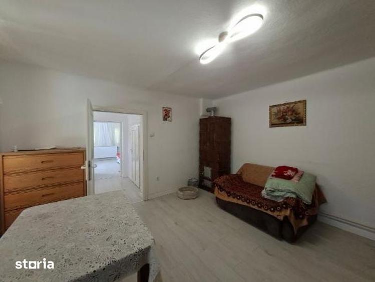 Casă cu 2 camere decomandat cu Teren 1150 Mp în Slimnic