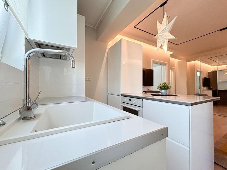 Apartament cu 2 camere semidecomandat, mobilat în Central