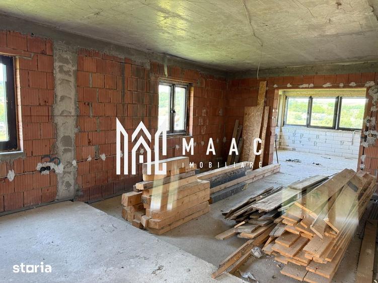 Casă individuală cu 4 camere cu Canalizare în Slimnic