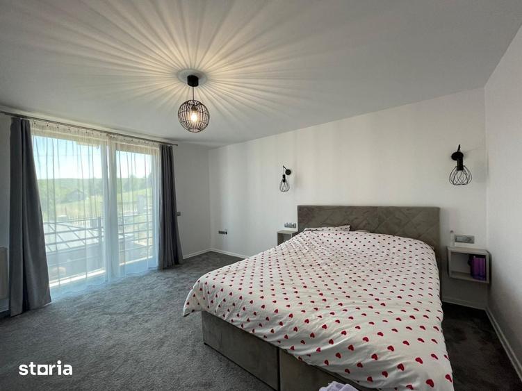 Casa individuala de vanzare cu 4 camere, amplasata pe un teren de 412 - 7