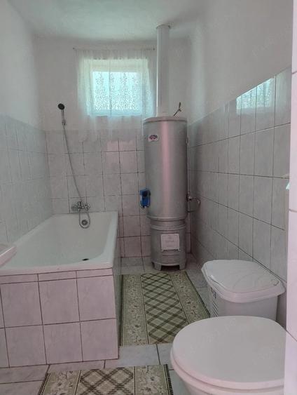 Casă cu Teren 1055 Mp în Central