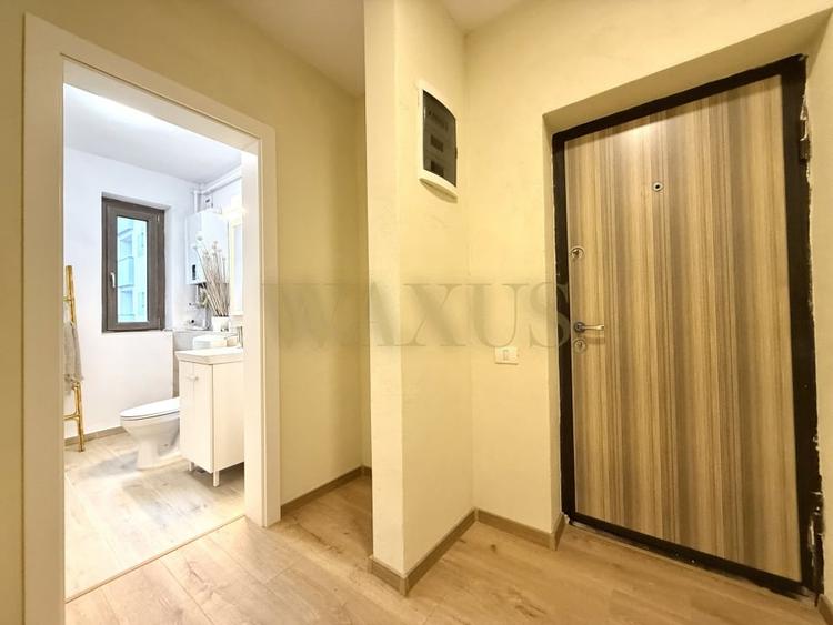 Apartament cu 3 camere semidecomandat, mobilat în Borhanci
