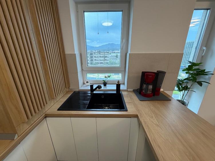 Apartament cu 2 camere decomandat în Tractorul