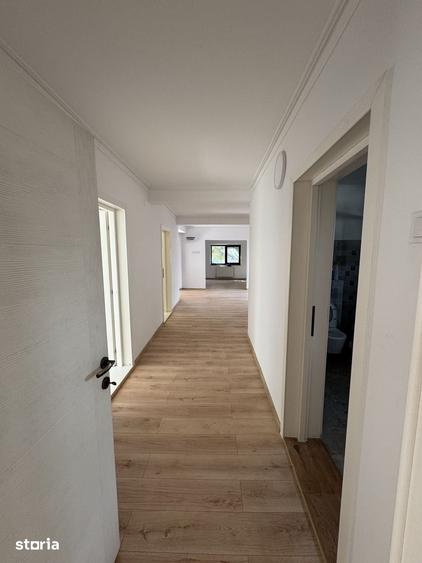 Casă cu 4 camere cu Teren 1000 Mp în Holboca
