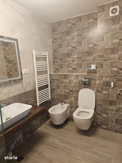 Apartament cu 3 camere în Tractorul