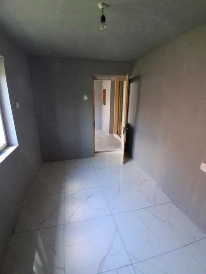 Casă cu 3 camere cu Teren 1500 Mp în Central