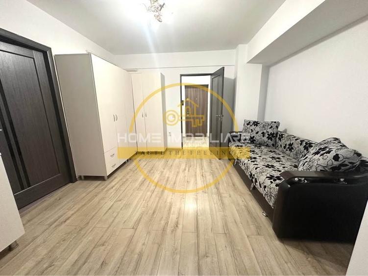Garsonieră decomandată, mobilată în Cug