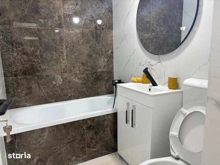Apartament cu 2 camere decomandat, mobilat în Berceni — fotografia 2