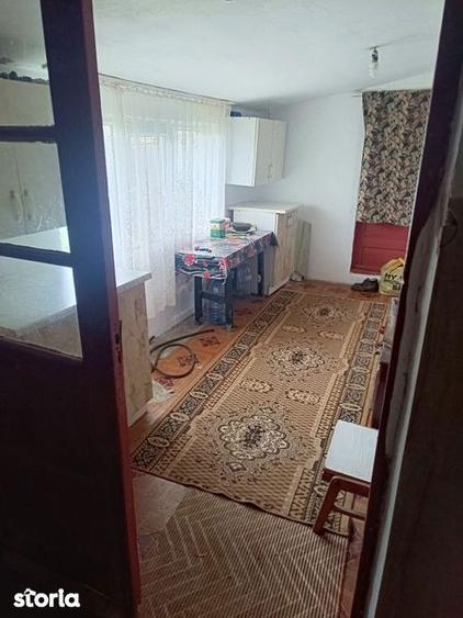 Casă cu 2 camere cu Teren 90 Mp în Bucu