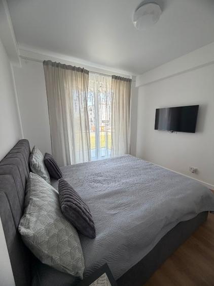 Apartament cu 3 camere decomandat, mobilat în Haliu