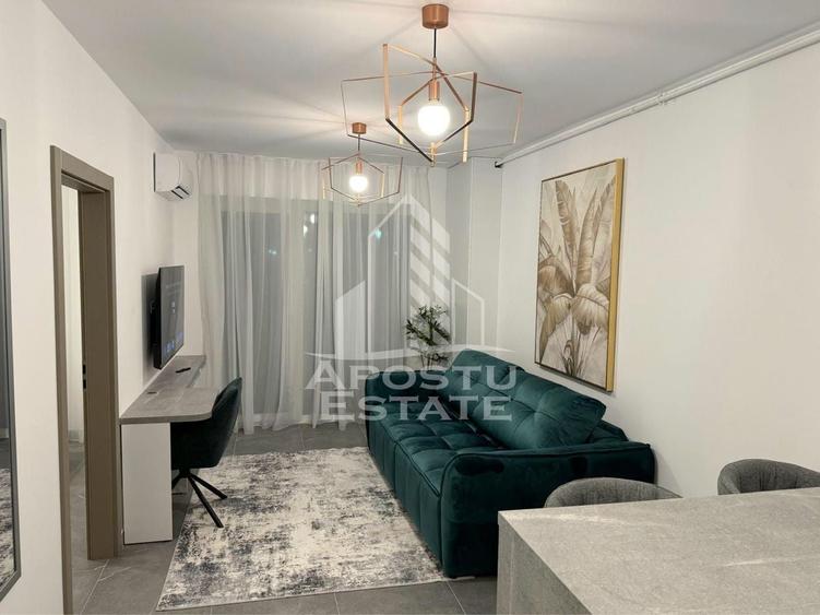 Apartament cu 2 camere semidecomandat, mobilat în UTA