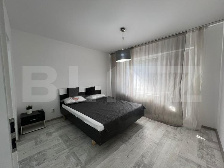 Apartament cu 2 camere semidecomandat, mobilat în Florești