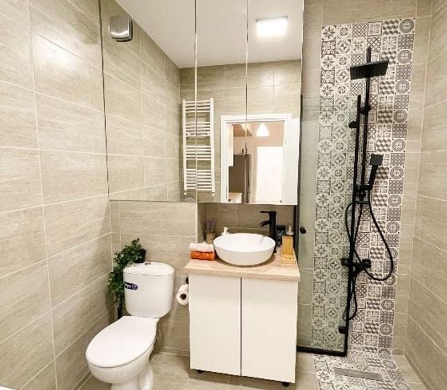 Apartament cu 3 camere semidecomandat, mobilat în Grozăvești