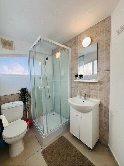 Garsoniera la Plaja 2 papuci - 1