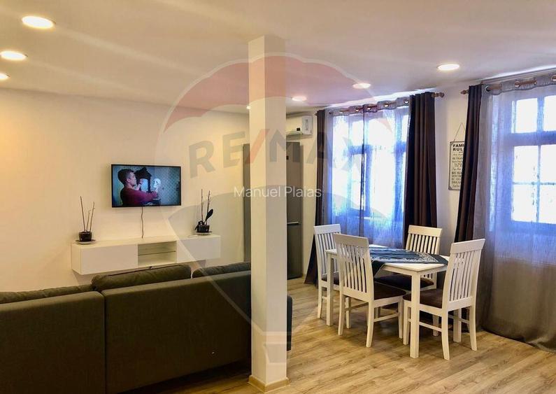 Apartament in zona Centrala, et.1, curte privata.