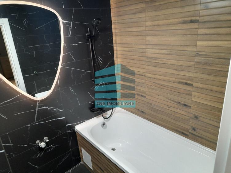 Apartament cu 4 camere decomandat în Titan