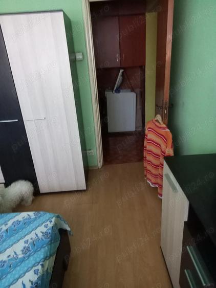 Camera in apartament de trei camere - 2