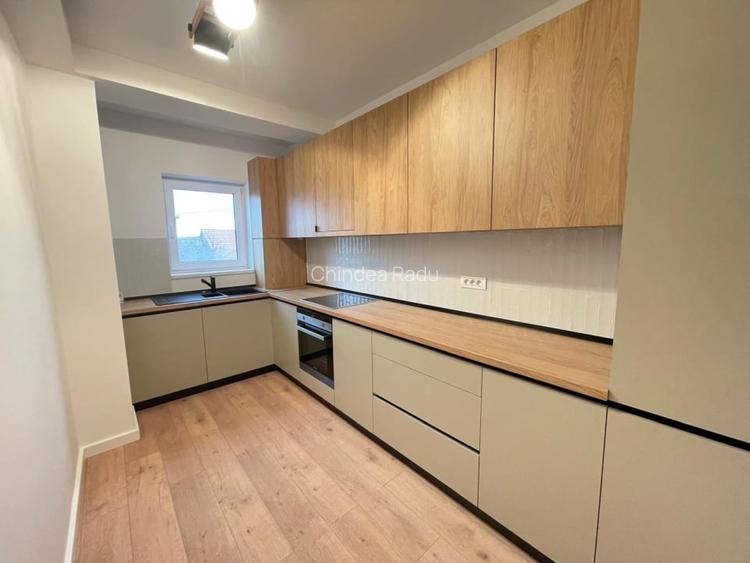 Apartament nou, 2 camere,  decomandat cu bucatarie inchisa