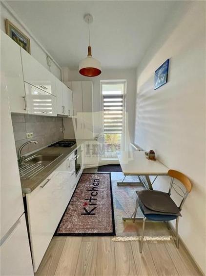 Garsoniera 29 mp decomandata cu gradina de 57 mp - 1