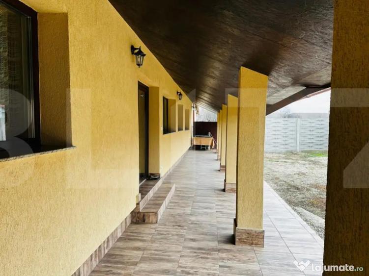 Casa spatioasa cu 5 dormitoare, doua bucatarii si teren de 1 - 11