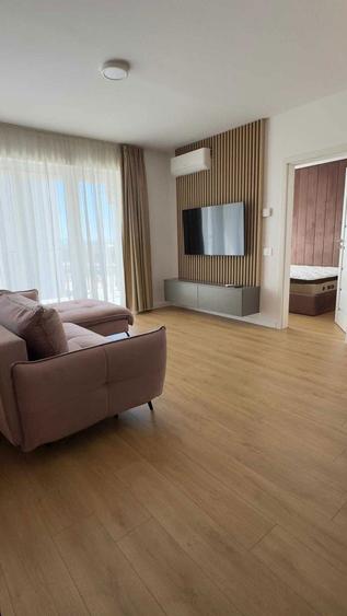 Inchiriez apartament 2 camere complet utilat, suprafata utila 52mp + balcon 7mp + loc de parcare - 2