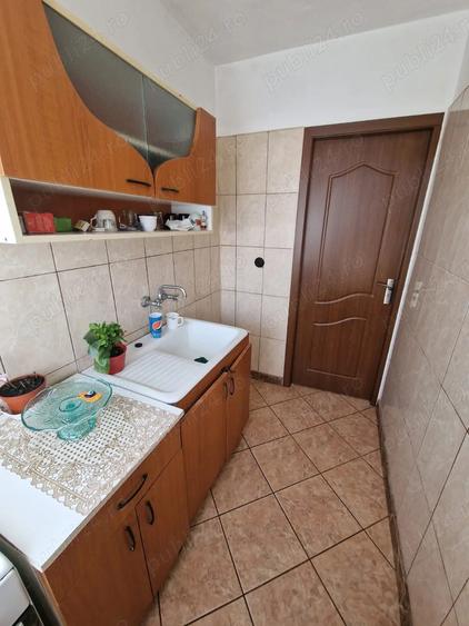 Apartament cu 2 camere la etajul 4 - 7
