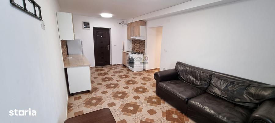 Apartament cu 2 camere semidecomandat, mobilat în Central