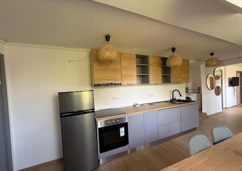 Apartament cu gradina la curte