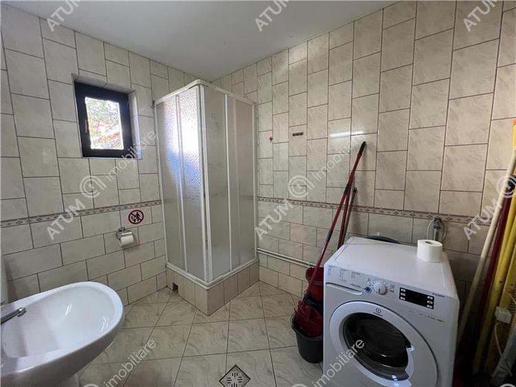 Pensiune de 7 camere cu 5 bai si teren de 377mp situata in Paltinis - 12