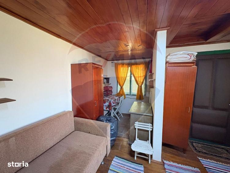 Teren intravilan 589 mp si cabana din caramida in Cuvin - 6