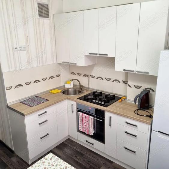 Garsoniera zona 1 Mai - 3