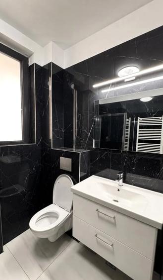 Apartament cu 3 camere semidecomandat, mobilat în Tunari