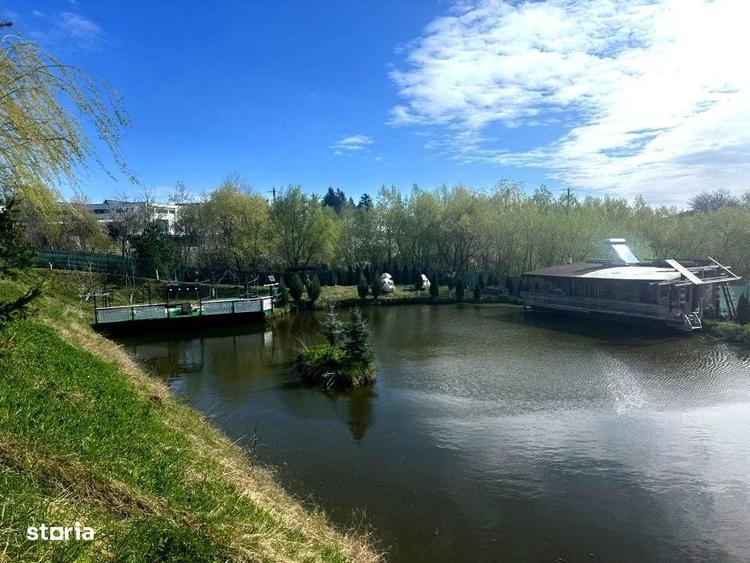 Teren de 6000mp, iaz cu peste, livada de nuci - Ilisesti - 30 km de Su - 1